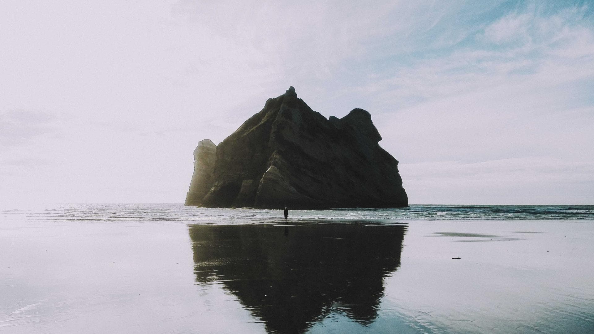 The final frame of the walk, figure against water